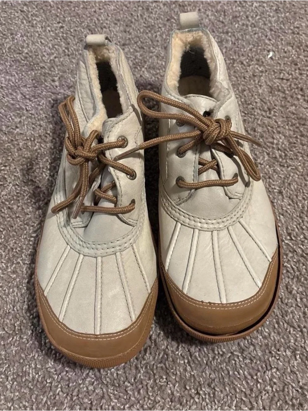 UGG Cream Leather Shearling-Lined Slip-On Sneaker with Tan Trim